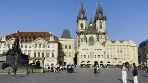 Camera pans medieval architecture in Prague Old Town Square Stock Footage 344600773
