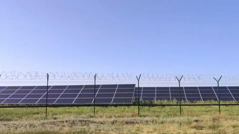 The camera pans next to the solar power plant. Shooting in motion. View of the s Video stock 138138590