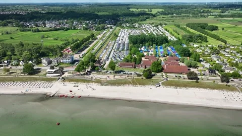 Camera pans over beach resort on Baltic Sea. Stock Footage 310903614