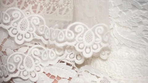 The camera pans over the bride's white dress. White dress of the bride close-up Stock Footage 238022669