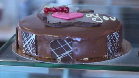 Camera pans over chocolate cake in bakery Stock-Footage 325351869