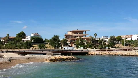 Camera Pans Over the Coastline of L'Ampolla, Catalonia Stock Footage 133401775