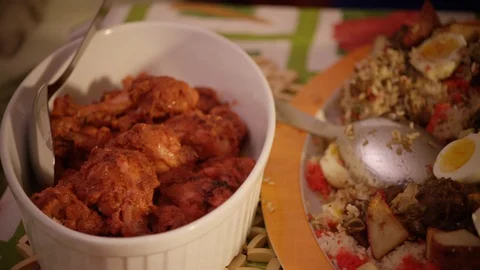 Camera pans over plate of prepared meat potatoes and chicken in kitchen Stock Footage 123735865
