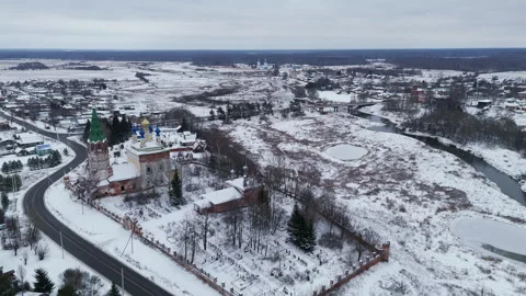 Camera Pans Over a Snow-Covered Village Stock Footage 297252250