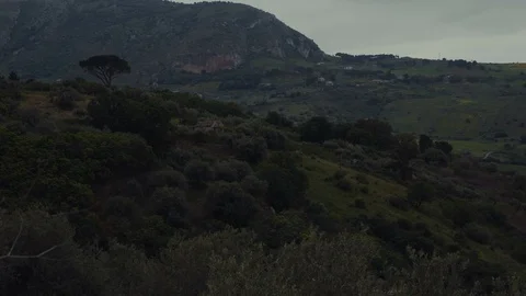 Camera pans right on green hills Stock Footage 88704281