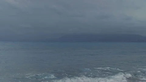 Camera pans right revealing hills in Sicily showing from Capo Zafferano Stock Footage 88677671