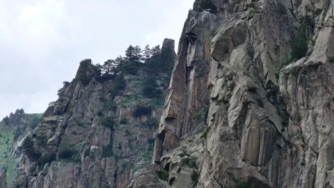 Camera pans to show the peaks of a mountain range Stock-Footage 289671893