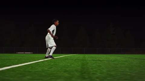The camera pans with a soccer team as they score a goal, in slow motion Stock Footage 56205653