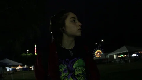 Camera pans to teen Stock Footage 80073144