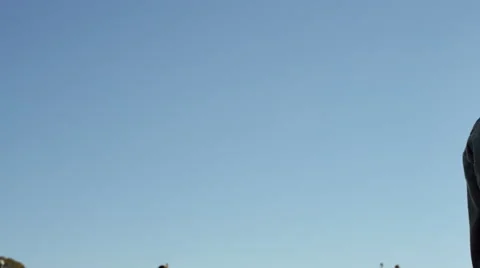 Camera pans onto two young lovers infront of the Eiffel tower. Video stock 63023150