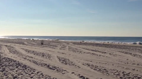 Camera Pans on Waves Breaking on the Beach 動画素材 41434867