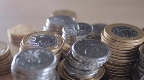 Camera pass by some Brazilian Coins Stock Footage 58510511