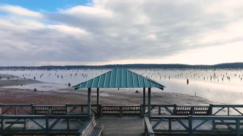 Camera passing over pier on almost empty lake, in Conway Arkansas. 스톡 동영상 266923869