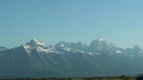 Camera passing snowy mountains Stock Footage 79475633