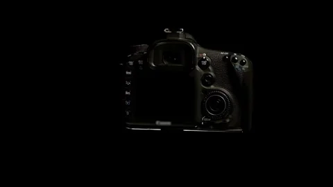 Camera for photos on a black background, camera on a black background Stock Footage 262063668