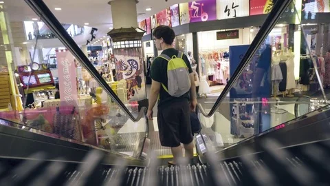 Camera placed on escalator going downwards Stock Footage 81881894