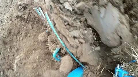 Camera on a plow of a tractor on a acre Stock Footage 52496032