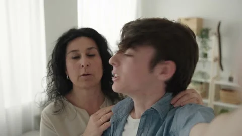 Camera point of view of mother and son streaming Stock Footage 239445112