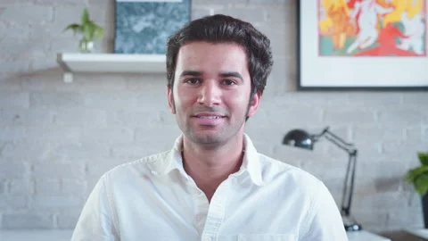 Camera POV of a young indian man having an online conversation in a remote video Stock Footage 137054635