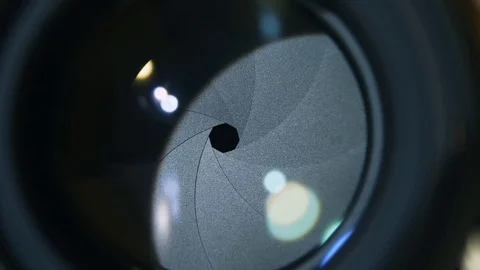 Camera prime lens. Close Up of opening camera aperture 스톡 동영상 84037260