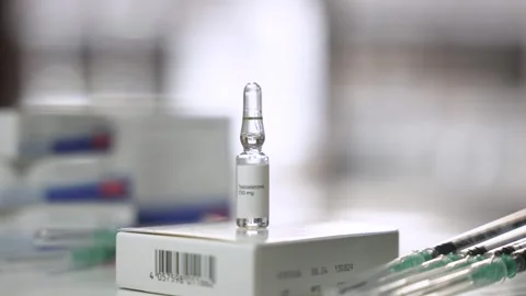Camera Pull Back of Testosterone Ampoule with Syringes Stock Footage 327479300