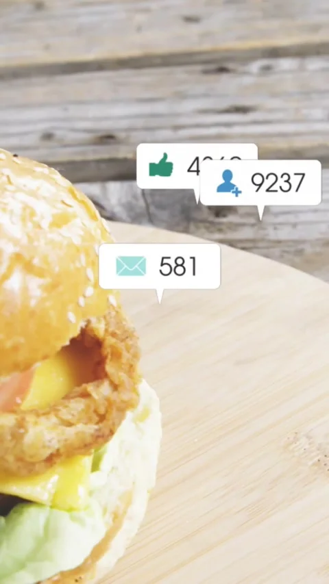 Camera pulling back, panning right, revealing burger, bubbles floating, boosting Stock Footage 331617032