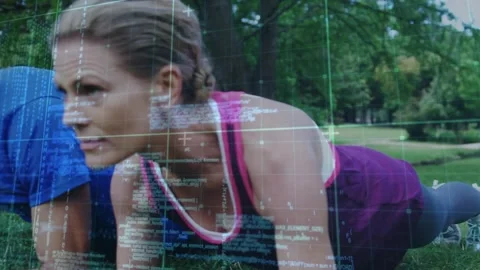 Camera pulling back revealing workout group holding forearm planks on lawn, HUD Stock Footage 322120364