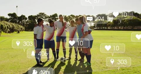 Camera pulling back sparking reactions rising as players huddling around ball, Stock Photos