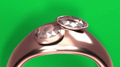 Camera pulling back tilting from macro, revealing rosegold ring bezels, showing Stock Footage 339198115