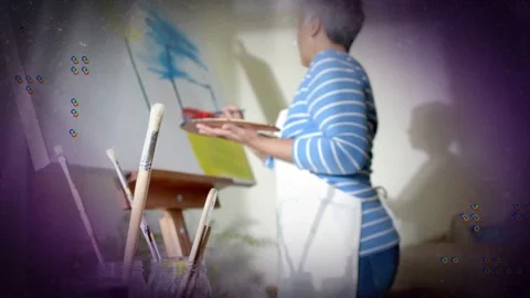 Camera pulling, painter lifting palette and painting blue or red strokes, Stock Footage 333463257