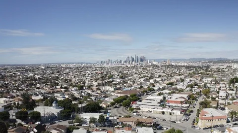Camera pulls back across urban sprawl with city on horizon Video stock 103115613