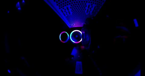 Camera pulls back from RGB cooler inside a PC. Tunnel effect with components Stock Footage 301169860
