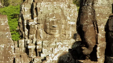 Camera pulls of out of focus to in focus on a two head carvings, Bayon 動画素材 42485510