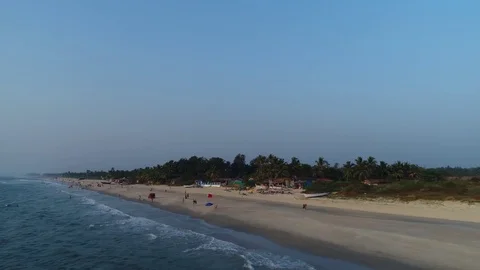 The camera quickly flies along the beautiful beach. Aerial view. Stock Footage 85066455