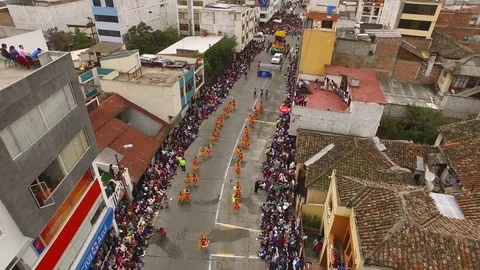 Camera Quickly Pans Down to a Carnival Float of the Sun and Flowers Video stock 73040988