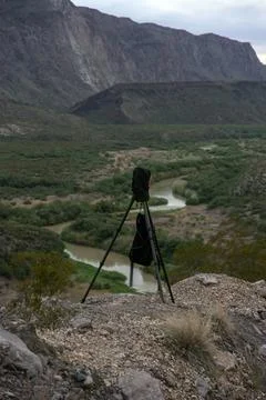 Camera Rain Sleeve Tripod Stock Photos