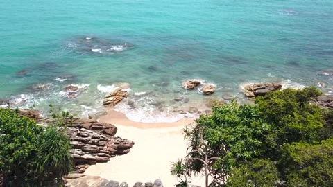 Camera is raising above from the beach to the sea. Outdoor adventure travel.. Stock Footage 276455351