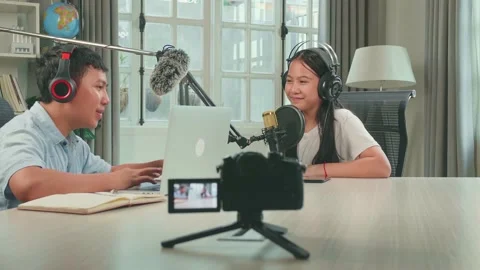 Camera Recording, Asian Boy Host Record Podcast Use Microphone Wear Headphone Stock Footage 164917877