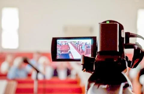 A camera recording a meeting 스톡 사진