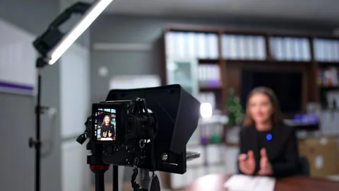 Camera records a female blogger sitting Stock Video Pond5