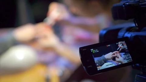 The camera records a manicure master class Stock Footage 105568983