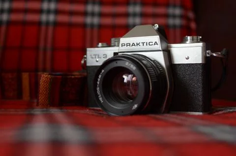 Camera on a red background Foto stock