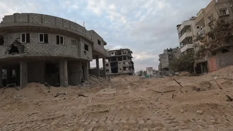 Camera reveals aftermath of destroyed city Gaza after airstrike, missile Video stock 256069905