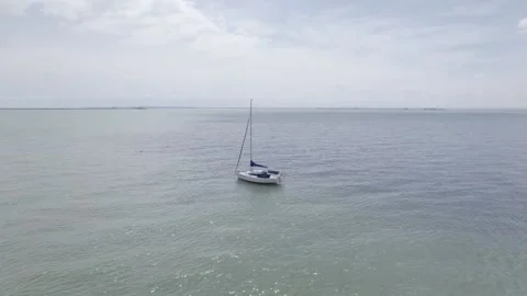 The camera revolves around the yacht by the sea Vídeos de archivo 159092982