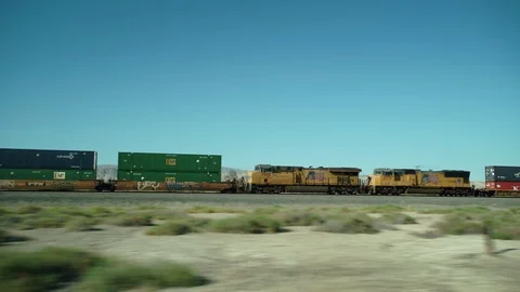 Camera rides along freight train crosses the California desert &amp; the Salton Sea 스톡 동영상 113648576