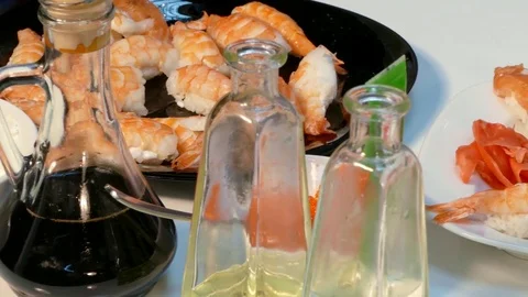 The camera rides dishes with sets of sushi Video stock 85420100