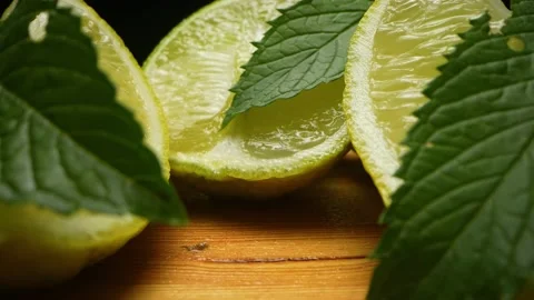 The camera rides inside sliced lemon slices. Dolly slider extreme close-up Video stock 201343493