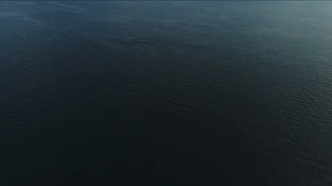 The camera rises from the bottom up from the water to the beautiful tropical Stock Footage 118274324