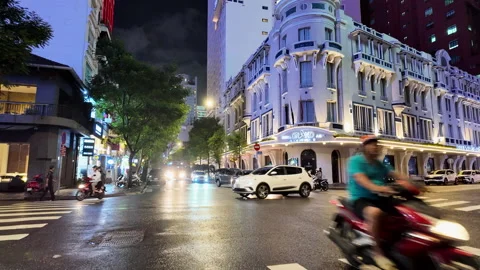 The camera rises on Dong Khoi in Ho Chi Minh City, Vietnam, capturing the Grand Stock Footage 304879918