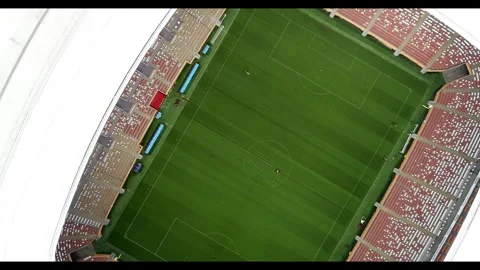 The camera rises high above the field of an empty stadium 스톡 동영상 270484283